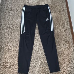 Addis’s track suit. (Pants) Juniors 12-14, medium. (Jacket) juniors 8-10, small